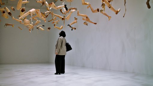 Kader Attia artwork of mannequin limbs suspended above