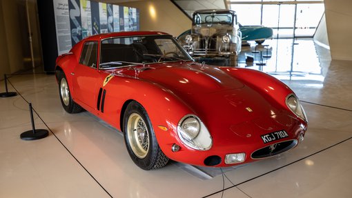 Red Ferrari 250 GTO from 1963 displayed at the National Museum of Qatar gallery space