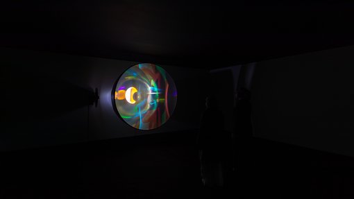 A multi-colour sphere of light.