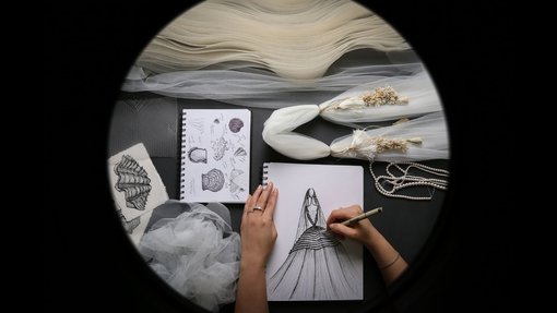 Designer sketching a gown