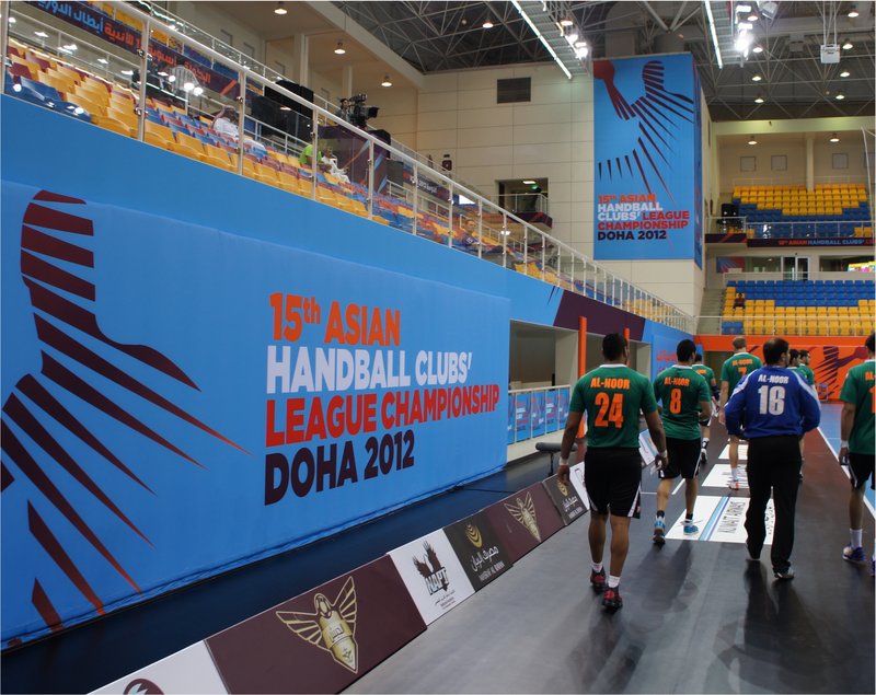 players in handball stadium