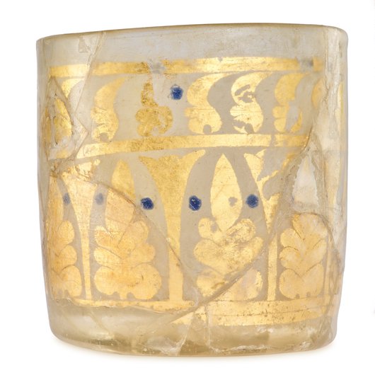 Glass beaker with gold leaf decoration