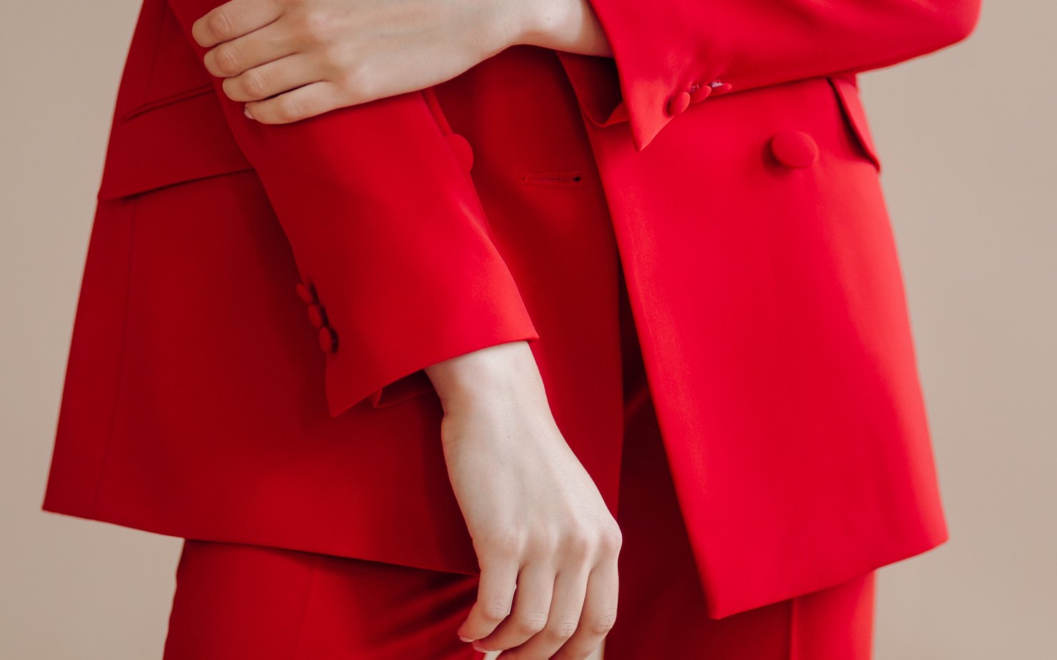 Women wearing red suit