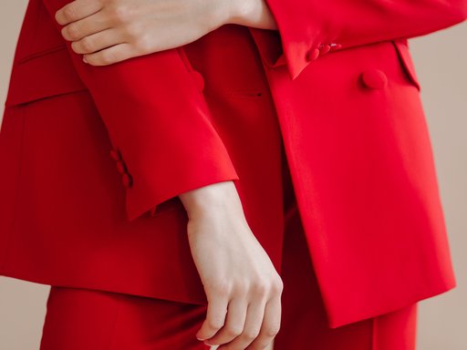 Women wearing red suit