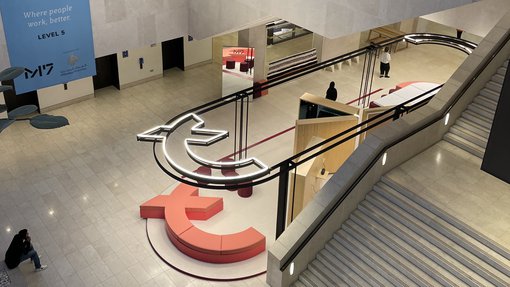 a top view on a lobby with an information booth