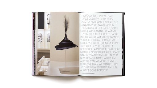 Two page spread of the Forever Valentino exhibition catalogue with image and text
