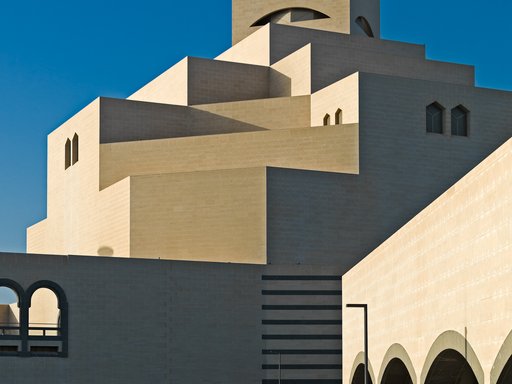 The exterior of the Museum of Islamic Art (MIA) showcasing its cream-coloured limestone and geometric five storeys