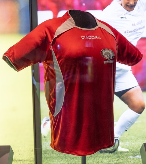 Red Palestinian Football Association shirt.