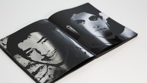 Two open pages of the book with negative silkscreened portraits