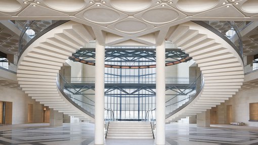 MIA's atrium showing curved staircases, glass walls and engraved ceilings