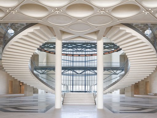 MIA's atrium showing curved staircases, glass walls and engraved ceilings