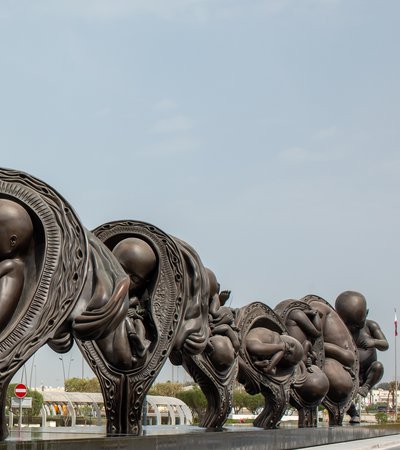 A series of 14 sculptures depicting the human gestational cycle, from conception to birth, located outside Sidra Medicine