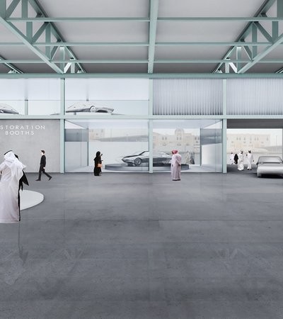 Rendering interior of the Qatar Auto Museum depicting animated people and cars in motion