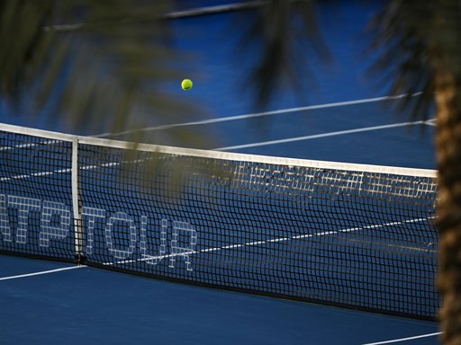 tennis court with a yellow ball